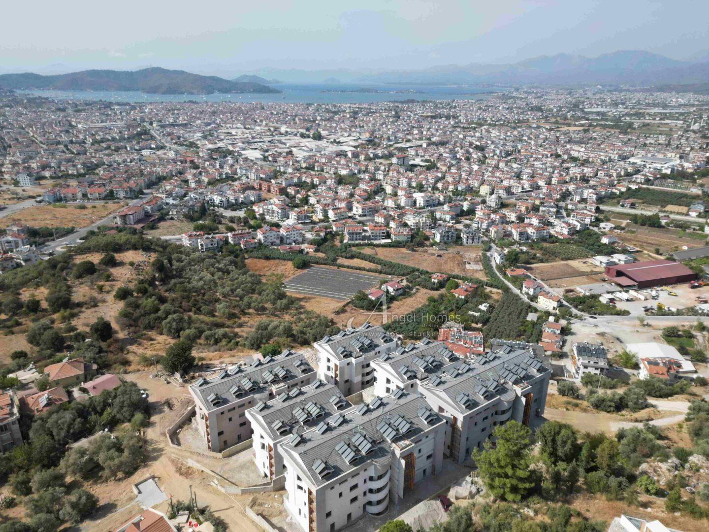 dji_fly_20241012_140248_205_1728731491996_photo ** İNDİRİMLİ ** FETHİYE ÇEVRESİNDE SATILIK DENİZ MANZARALI DAİRELER